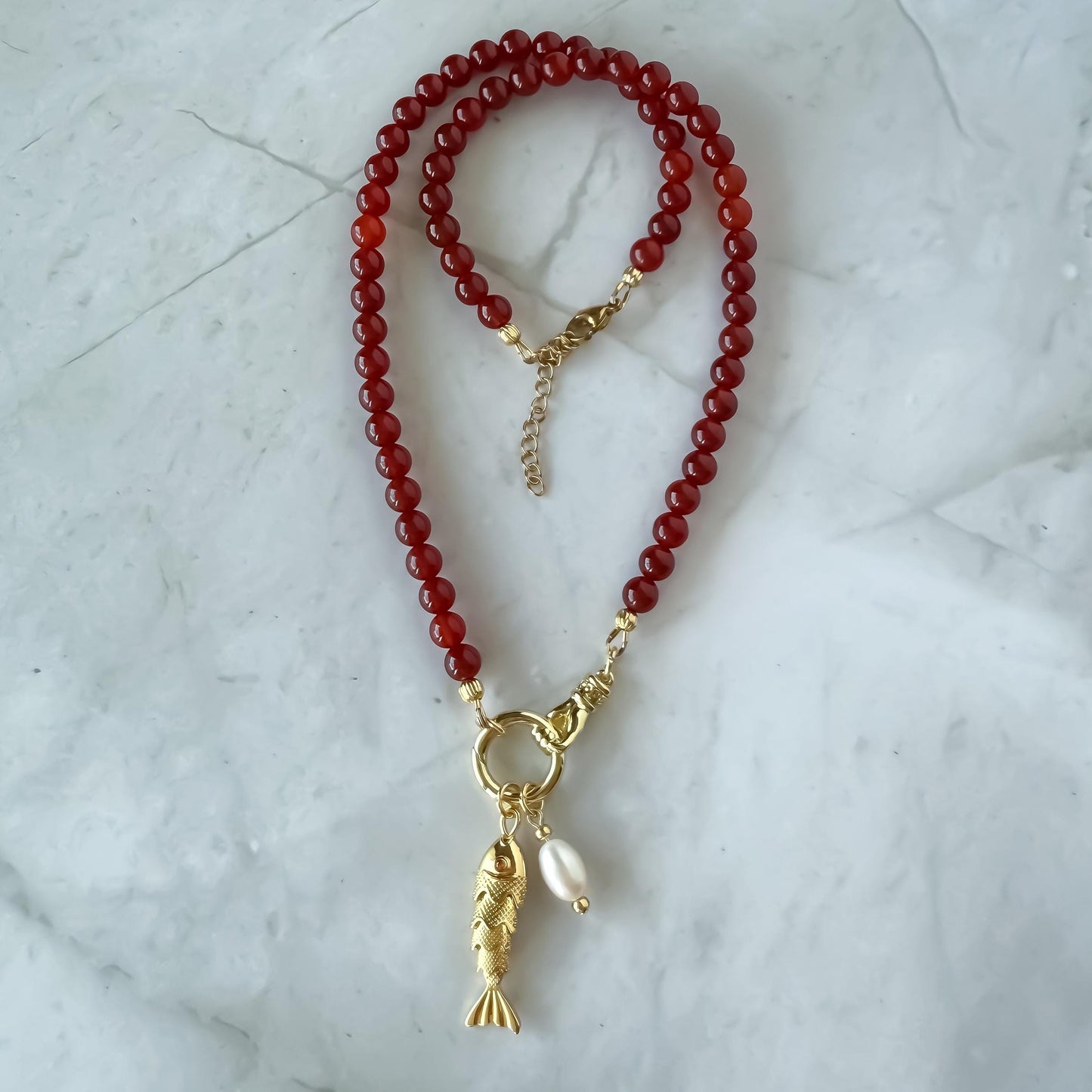 Red Carnelian Beaded Necklace: Articulated Fish & Pearl Charms