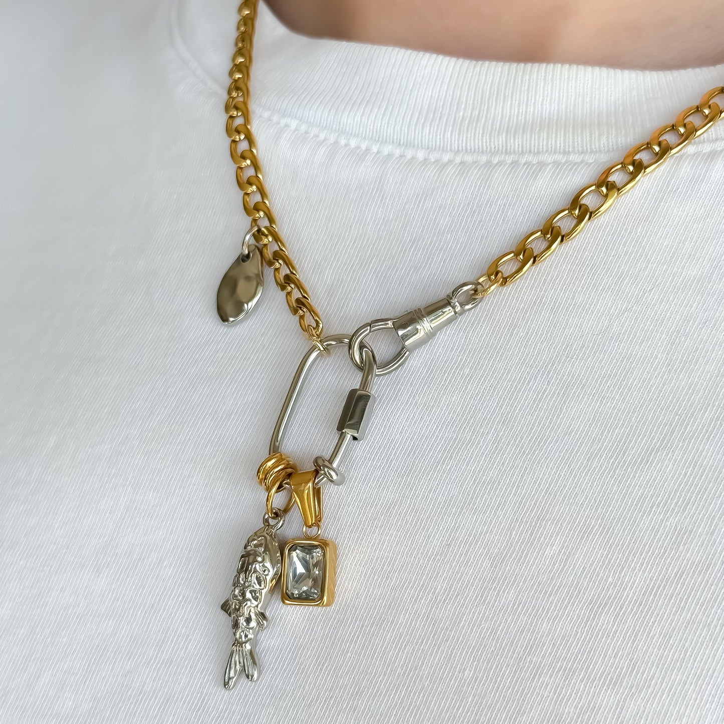 Mixed Metal Charm Necklace – Two Tone Fish Charm, Gold Crystal Accent & Abstract Hammered Detail